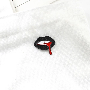 Gothic black glitter lips brooch with white teeth and dripping red blood enamel detail