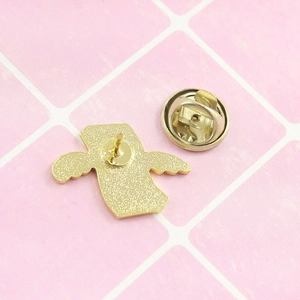 Creative flying dollar brooch with gold wings design and secure butterfly clutch back