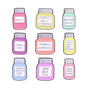 Set of 9 colorful enamel jar brooches with mental health slogans on white background