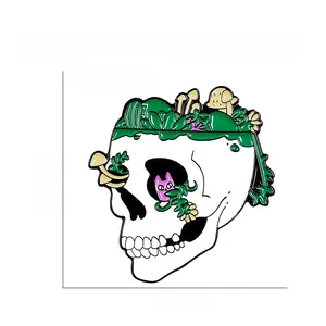 Detail of skull enamel pin with green plants, yellow mushrooms and purple kitten