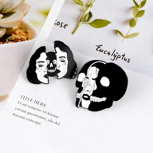 Gothic witch split face skull enamel brooch set on elegant white botanical card background