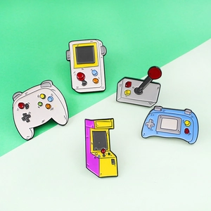 5-piece set of retro game console enamel pins featuring joystick and handheld motifs