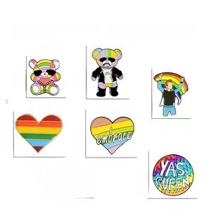 Vue détaillée de six épinglettes en émail arc-en-ciel avec dimensions et motifs variés