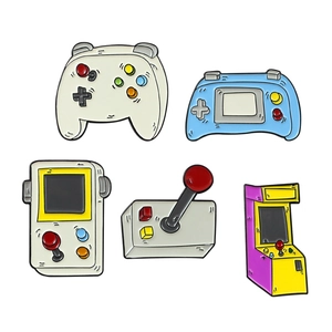 5-piece retro gaming enamel pin set featuring gamepads, consoles, and arcade machine pins