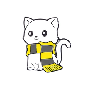 Cute cartoon white cat enamel pin with yellow and black striped scarf on white background