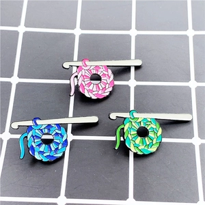 Handmade crochet theme enamel pins in pink, blue, and green for clothing decoration
