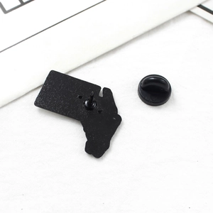 Punk skeleton hand envelope enamel pin back view with matte black finish and rubber clutch
