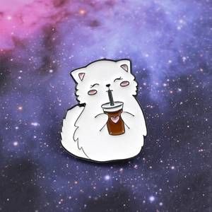 Cartoon white cat enamel pin drinking lemon tea on a purple starry background