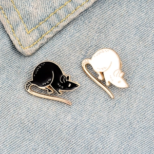 Cartoon black and white mouse enamel pins on denim jacket with gold alloy edges