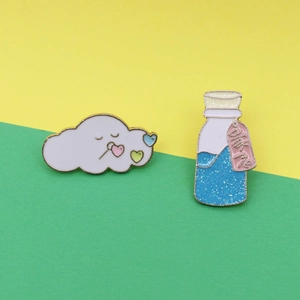 Cute sleeping cloud with hearts and blue glitter wish bottle enamel pin set