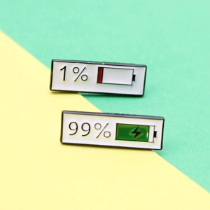Creative battery status enamel pins set with 1% low and 99% charging icons for couples
