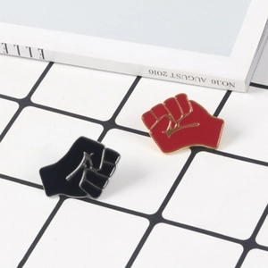Creative red and black fist enamel brooch pins set with gold metal outlines for teams