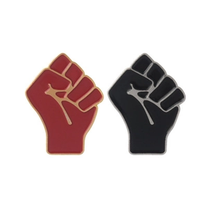 Creative clenched fist enamel pins in red and black colors with metallic edges