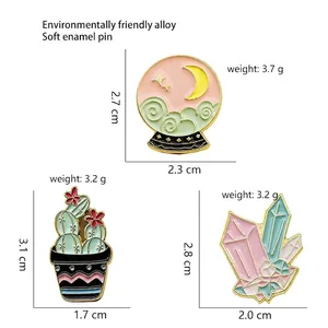 Three-piece enamel pin set with cactus, crystal, and moon cloud designs in alloy