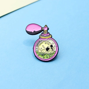 Gothic skull perfume bottle enamel brooch pin with pink bulb and green liquid design