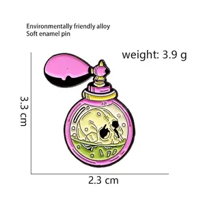 Gothic pink perfume bottle brooch with skull detail and green liquid made of alloy