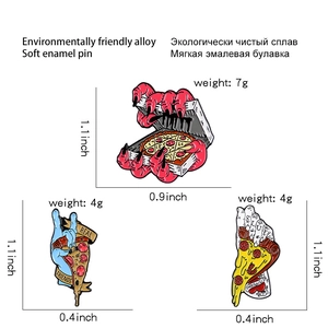 Detailed view of pizza enamel brooches featuring monster hands and Real Friends text