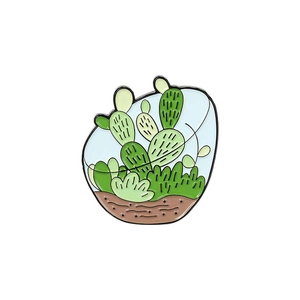 Creative terrarium enamel pin with vibrant green cactus and succulent plant design