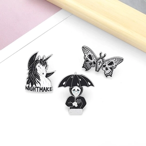 Set of 3 dark aesthetic enamel pins featuring unicorn, umbrella girl, and skull butterfly