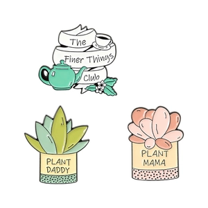 Three-piece enamel pin set featuring The Finer Things Club and Plant Parent succulent designs