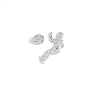 Macro detail of movie character brooch back showing texture and butterfly clutch pin