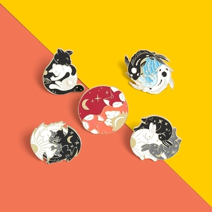 Yin Yang style animal enamel pins featuring cats, koi fish, foxes and dragons on a split background