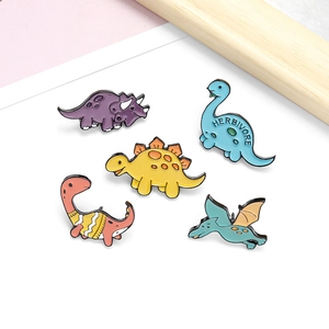 Set of 5 colorful cartoon dinosaur enamel pins featuring cute prehistoric animal designs