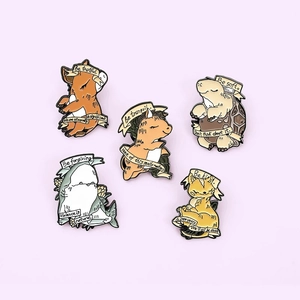 Set of five cartoon animal enamel pins with inspirational and humor quotes
