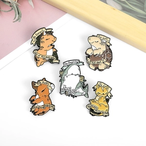 Five-piece set of healing animal enamel pins with motivational ribbons on white background