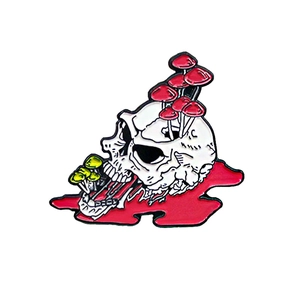Punk style skull and mushroom enamel pin with artistic red mushroom head details