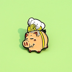 Pin's en émail cochon tirelire rose avec pièce de monnaie dorée et gant de dessin animé