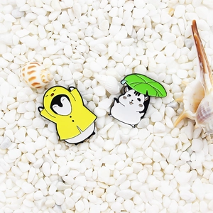 Cute enamel brooch set featuring yellow raincoat penguin and hamster with lotus leaf umbrella