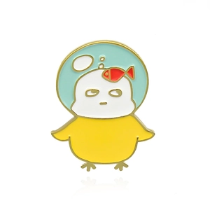 Cartoon yellow duck enamel brooch with blue magic hat and fish design on white background