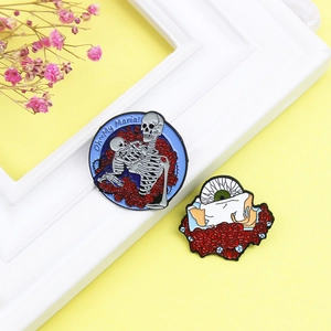 Gothic skull mother holding baby and eyeball with red rose enamel pins on yellow background