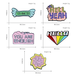 Set of 5 colorful enamel motivational pins including angel wings and rainbow designs