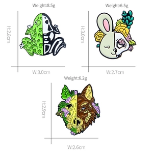 Artistic animal enamel pins featuring frog rabbit and wolf with floral skeleton details