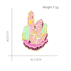 Detail view of crystal forest brooch with mushroom and crescent moon measuring 3.2cm height
