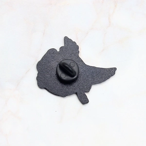 Creative crane bird brooch back view with durable black rubber clutch on metal base