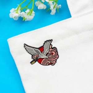 Creative flying crane and red sun enamel pin on white canvas bag accessory