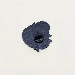Back view of octopus enamel pin with textured black metal and rubber clutch closure