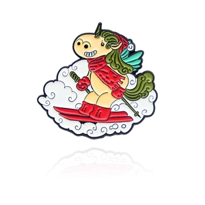 Spilla in smalto con unicorno che scia, colori vivaci e tema sportivo invernale creativo