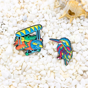 Cartoon crocodile in helicopter and colorful bird pins on white pebble background