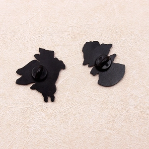 Back view of creative flying pig enamel pin with black butterfly clutch and alloy metal base