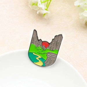 Landscape mountain brooch with sunset river design in cat ear shape alloy badge