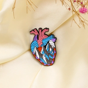 Artistic iceberg heart enamel brooch pin for women, featuring anatomy design on silk background