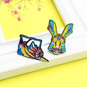 Creative rabbit and snail enamel pins on a stylish yellow and white background