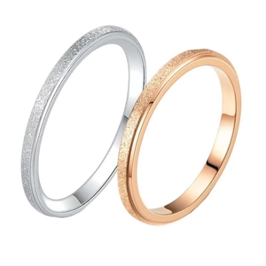 Two minimalist stainless steel rings with elegant frosted and polished finish