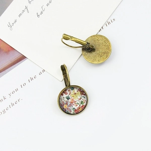 Vintage bronze leverback earrings with colorful floral glass cabochon pattern