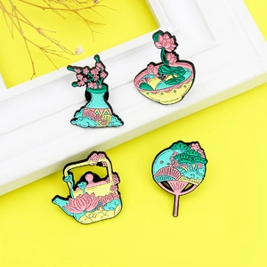 Elegant lotus flower and teapot enamel pin set with traditional Chinese art style