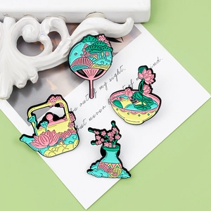 Elegant four-piece lotus flower and teapot enamel pin set with traditional floral motifs